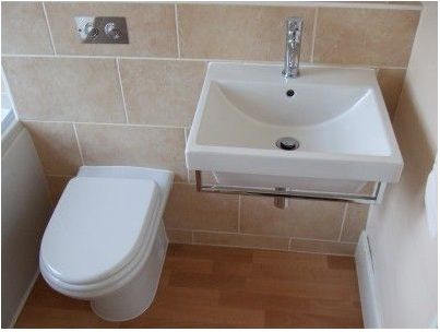 R. Wilson Bathrooms toilet and sink