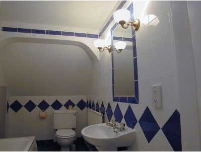 R. Wilson Bathrooms blue tiles
